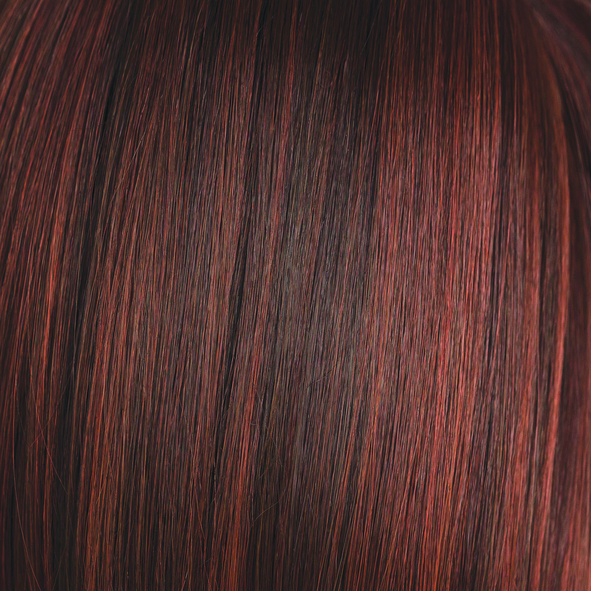 Burnt Chili  -  This sassy, spicy red is irresistible with a slight depth to the root flowing into rusty red and cherry color. Burnt Chili gives off many different red tones and red lights.  This coppery concoction is flawless and is one of our high heat colors.