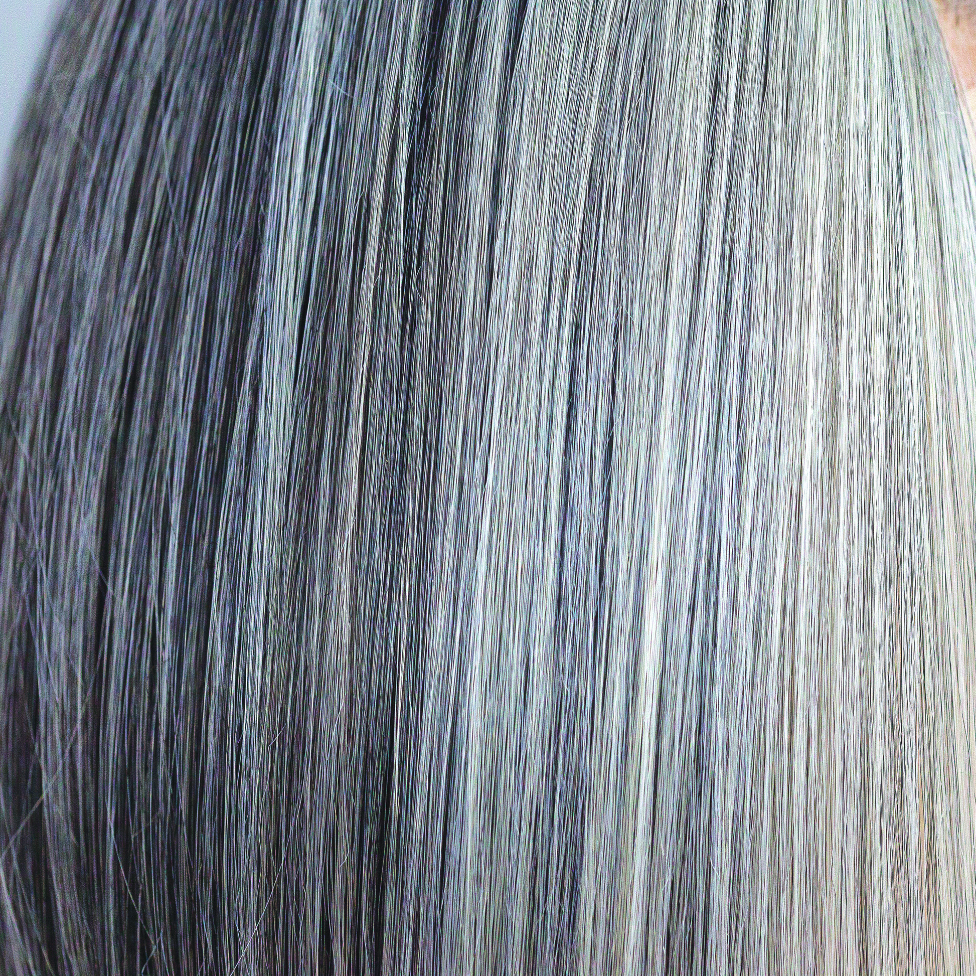 Canyon Stone  -  A natural grey color with many different shades running throughout. This opulent blend has a whole host of tones including slate, white, pewter, silver and steal. A much favored option and suits all ages and skin tones and is one of our high heat colors.