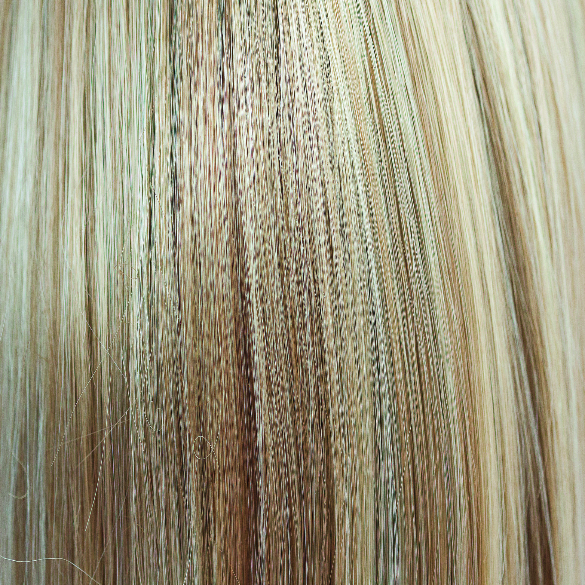 Champagne Blush  -  A very natural but very interesting champagne honey blond with tones of toffee and buttermilk subtlety getting lighter towards the ends. Champagne Blush is a decedent and flattering tone very wearable.