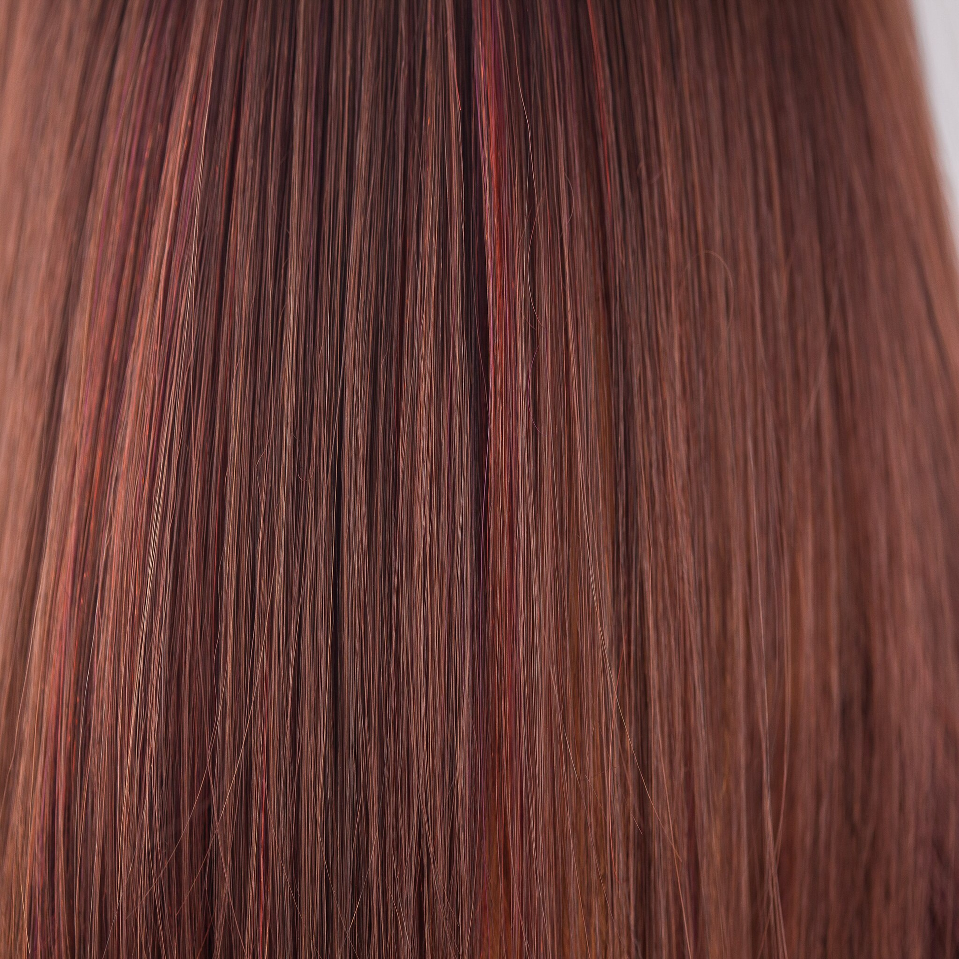Cherrywood  -  A hybrant underlighted medium red brown mix has a multitude of tiny chocolate and rich cherry tones and fine flashes of ruby scarlet. Beautiful and delicately textured bringing out all the definition and shine of the style.