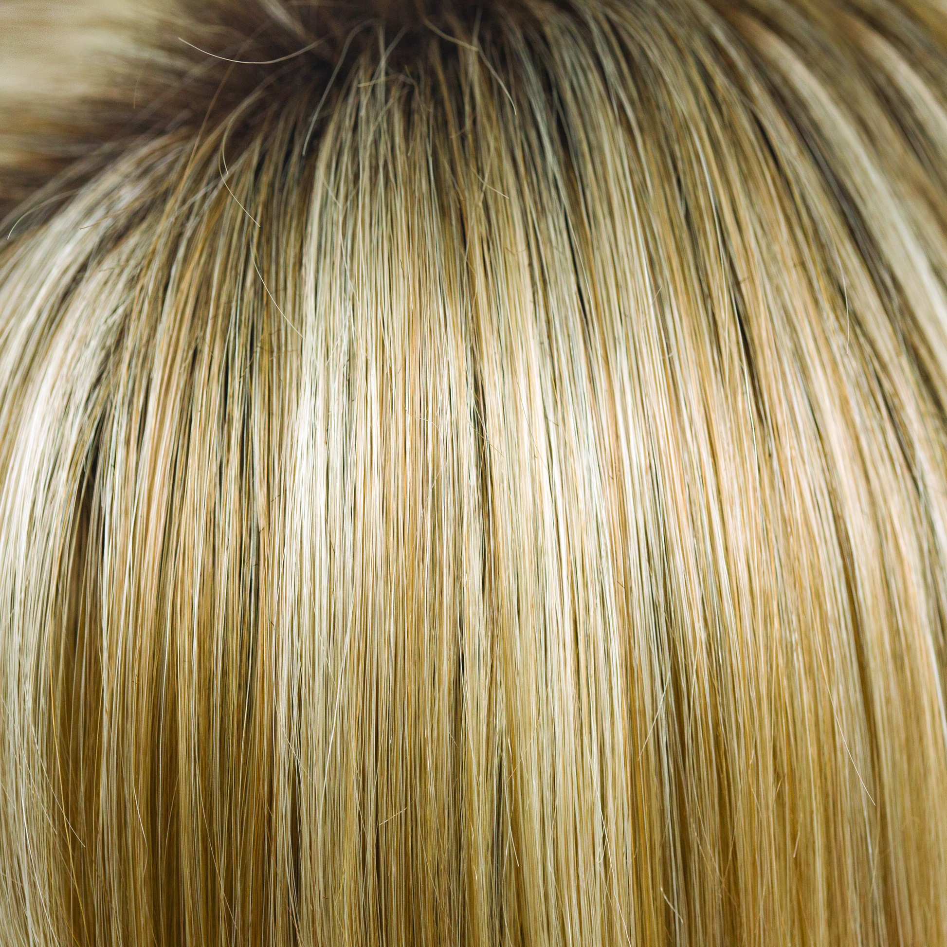 Creamy Toffee-LR  -  An ombre version of Creamy Toffee R, it is a rich medium brown chocolate stretched root, blended into cool, gold honey tones and cream blond with a toffee twist. This is very fashion forward working great both with longer styles and mid length cuts.