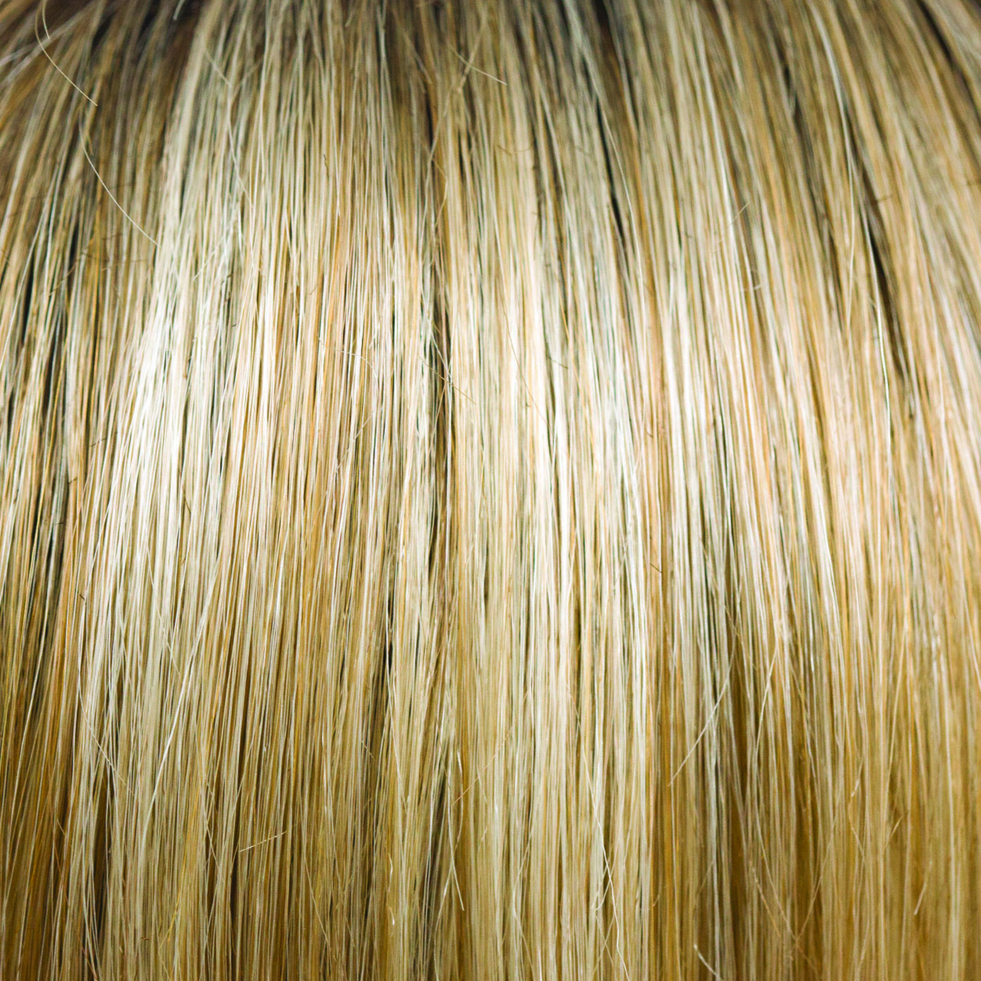 Creamy Toffee  -  A warm based blond, running with very fine cream highlights and weaved to perfection. This beautiful color has a gold glow and undertones of coffee.