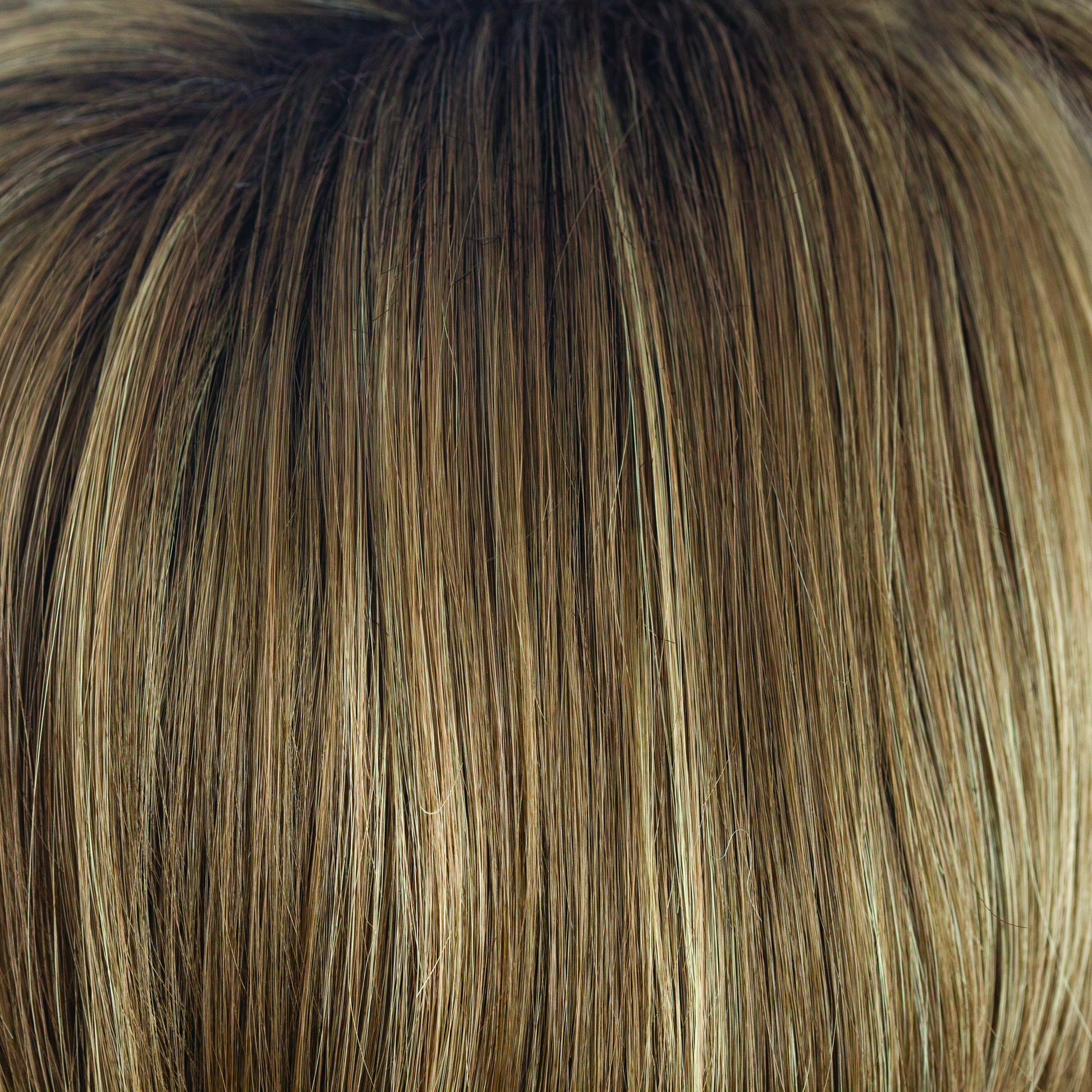 Honey Wheat  -  This wheaty wonder suits all ages and skin tones. Identical to Honey Wheat-R, without the chocolate brown root. This delightful medium blond is full of slices with tones of honey and cream