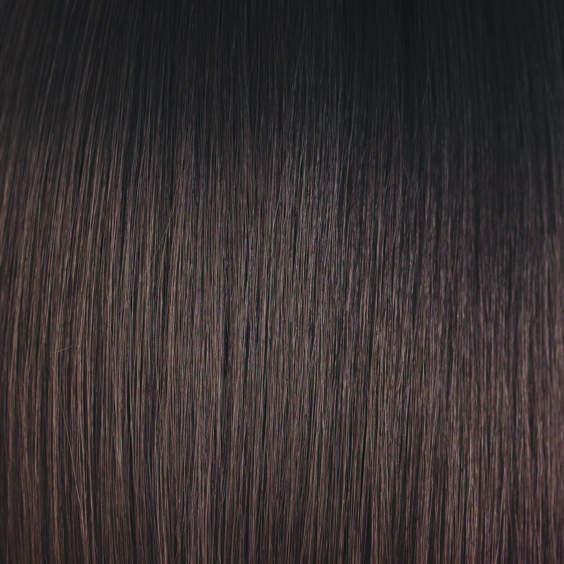 Hot Chocolate  -  An expensive looking color is a dark brown with a subtle blend of dark chocolate and milk chocolate tones, while maintaining a natural regrowth which keeps this color looking very realistic. Hot Chocolate is one of our high heat colors.