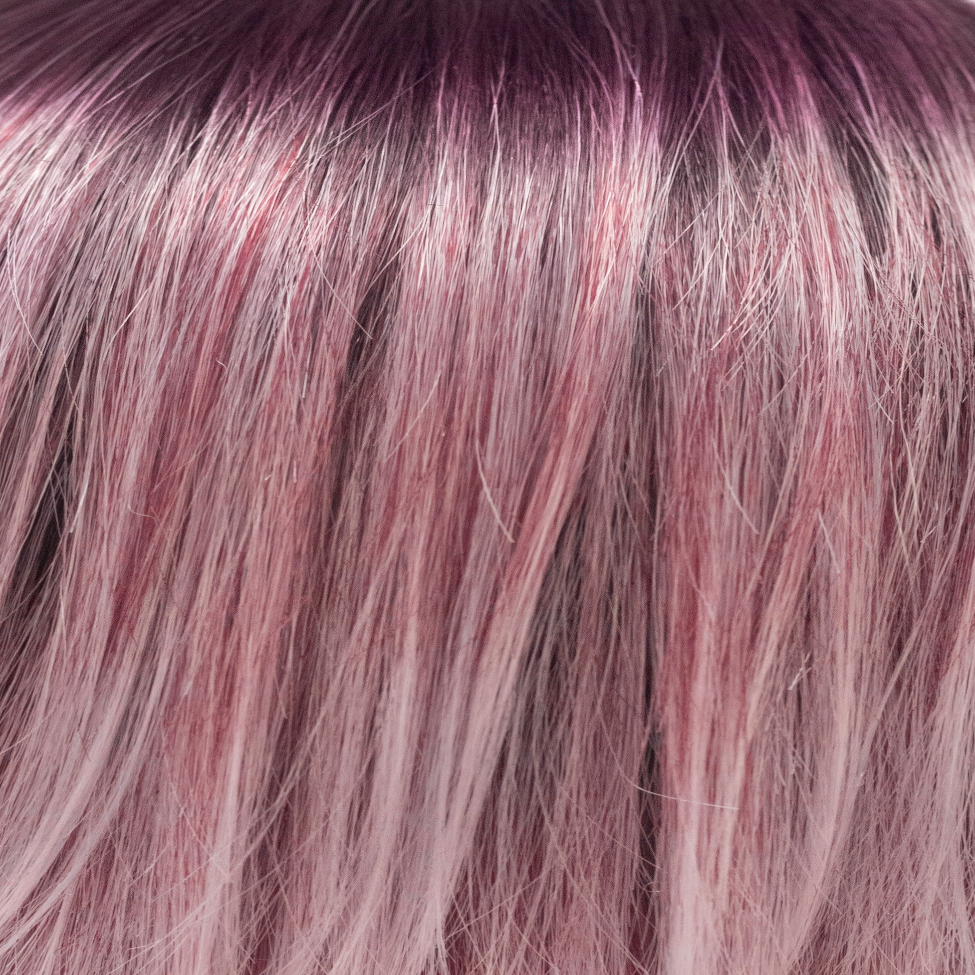 Melted Plum  -  A very intelligent color! It has dark amethyst stretch roots that blend into medium vibrant violets and finish to pale lavender blond ends. This suits all……. super, vivid and chic!