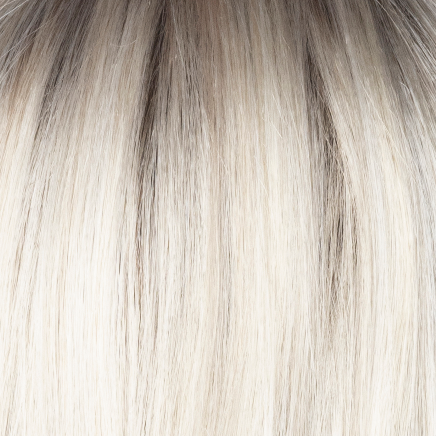 Milky Opal-R - A real showstopper! A gorgeous, rooted blond with a mid-warm brown root which transcends beautifully into the expertly woven cream and white blonds with a deeper tone running throughout the bottom and has a subtle opal hue.