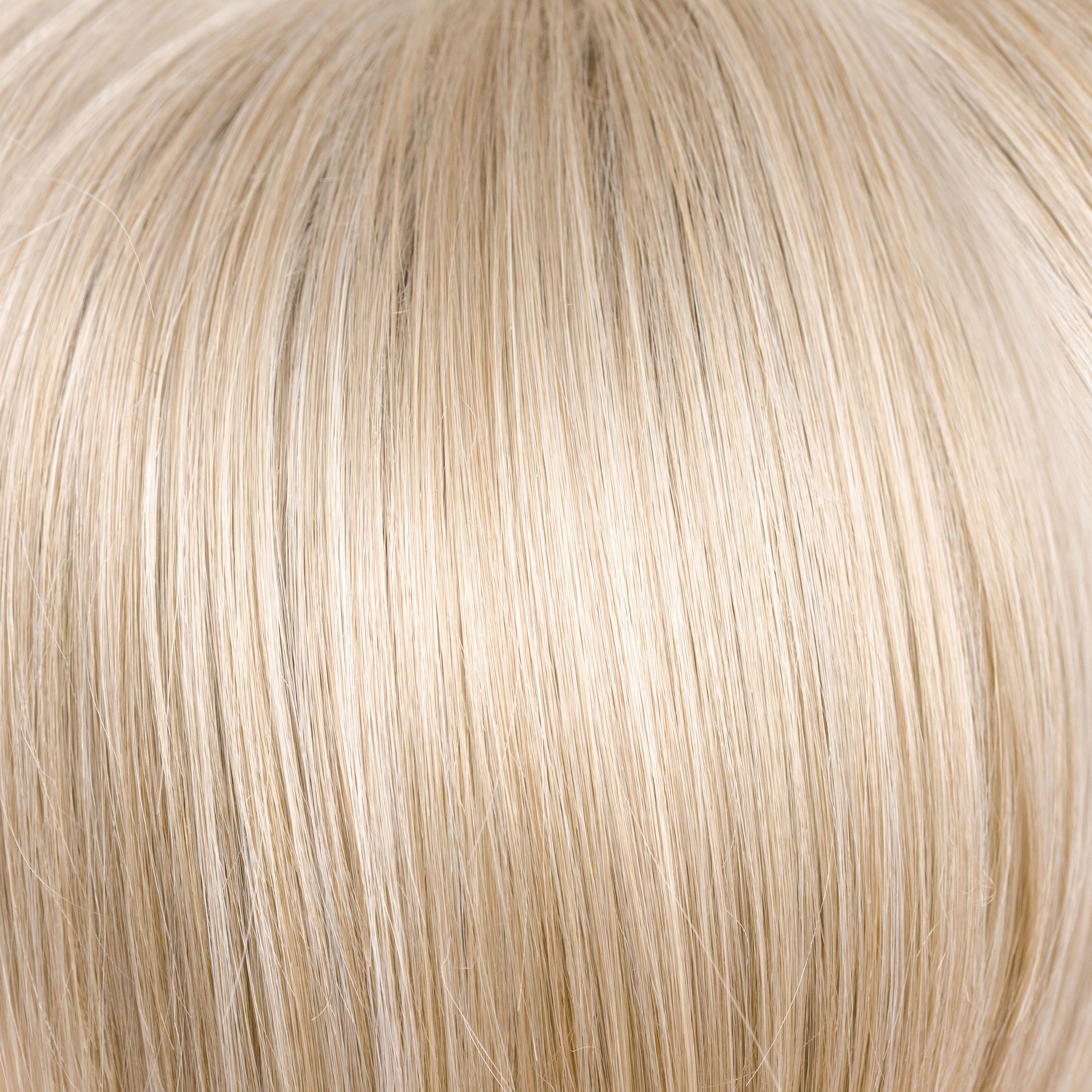 NM Creamy Blond  -  This bombshell blond is packed with platinum blond and creamy highlights. The lightest of our traditional blonds. Though it is very light, it is still able to flatter the skin tone with its unique blended formula.