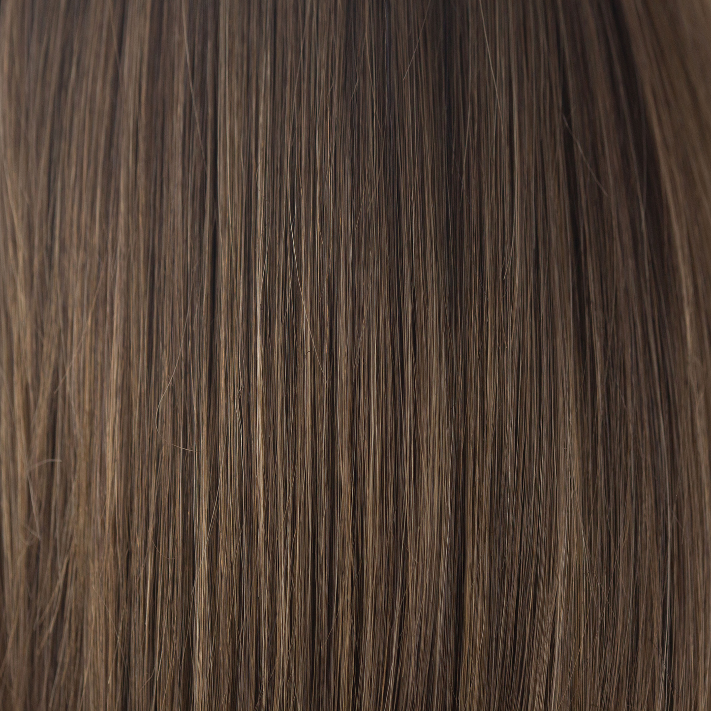NM Medium Brown - This cool-toned medium brown is a perfect fusion for both brown and blond enthusiasts. Medium Brown is a beautiful blend of both worlds - an ageless classic.