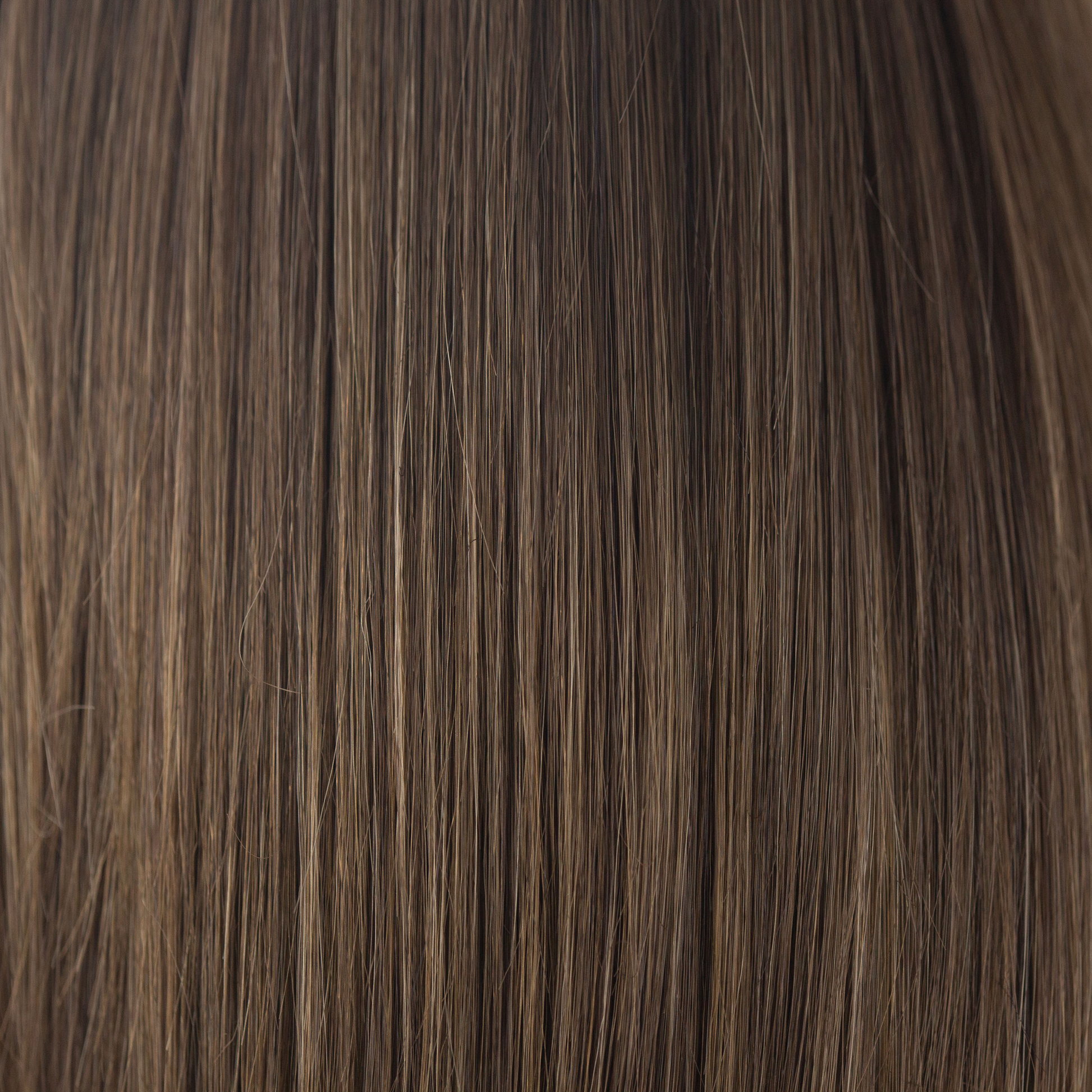 NM Medium Brown  -  This cool-toned medium brown is a perfect fusion for both brown and blond enthusiasts. Medium Brown is a beautiful blend of both worlds - an ageless classic.