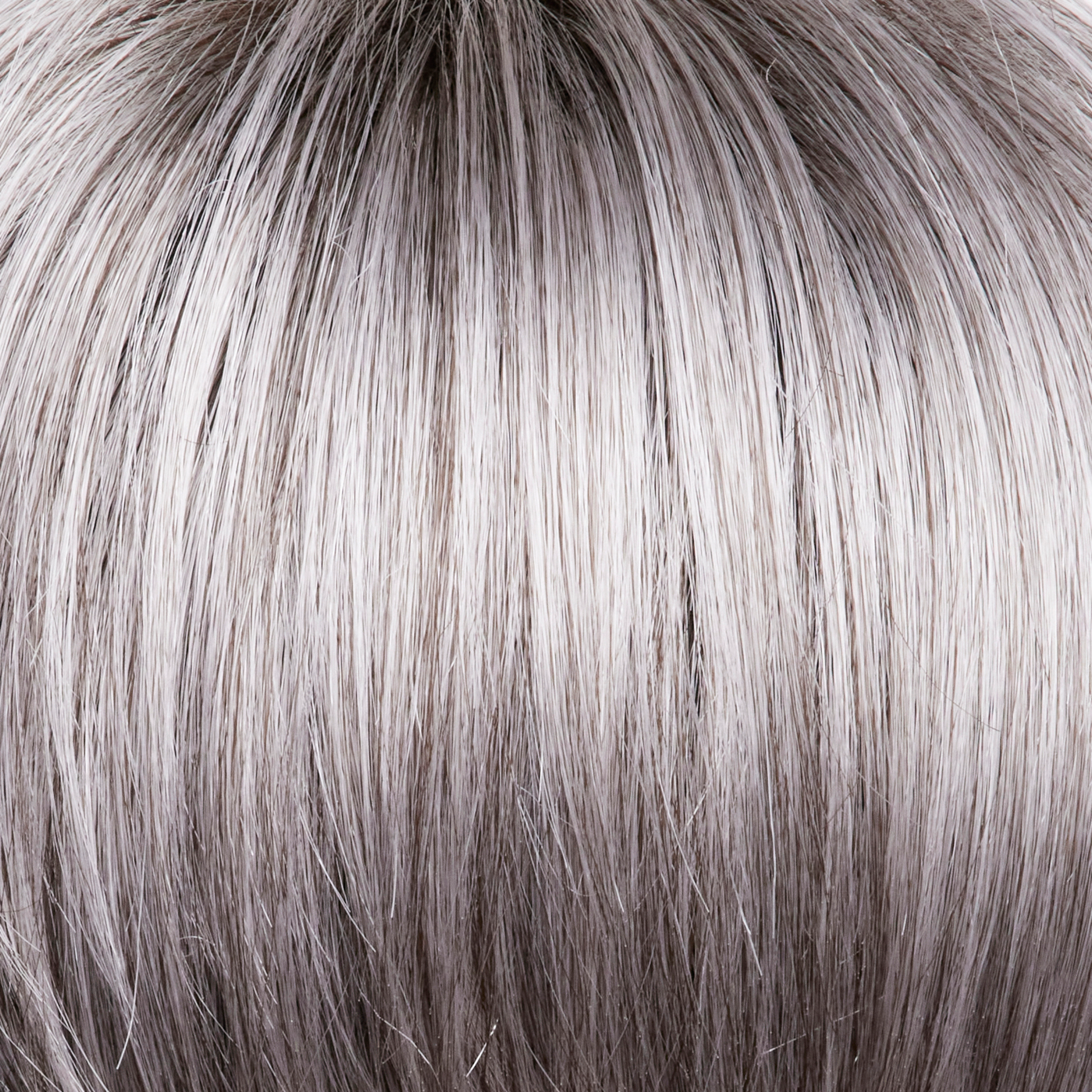NM Silver Stone  -  This is color is a must-have silver tone. Silver Stone is natural and realistic with gradation starting as a silvery white and ends as a dark salt-and-pepper tone at the nape. Effortless beauty is achieved with this color!