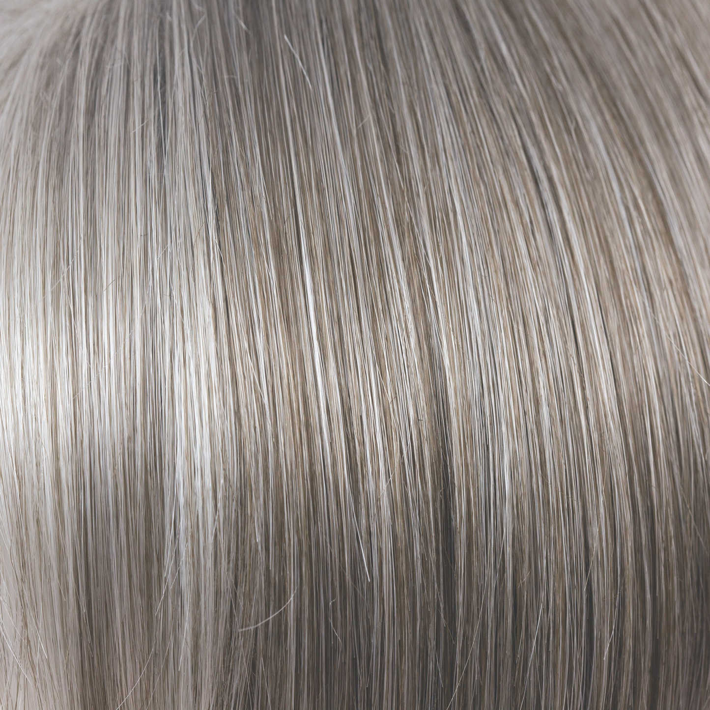 Sandy Silver - This gray tone is a warm, medium brown base with a mix of silvery white highlights. The color gradually goes from lighter at front to darker at nape.