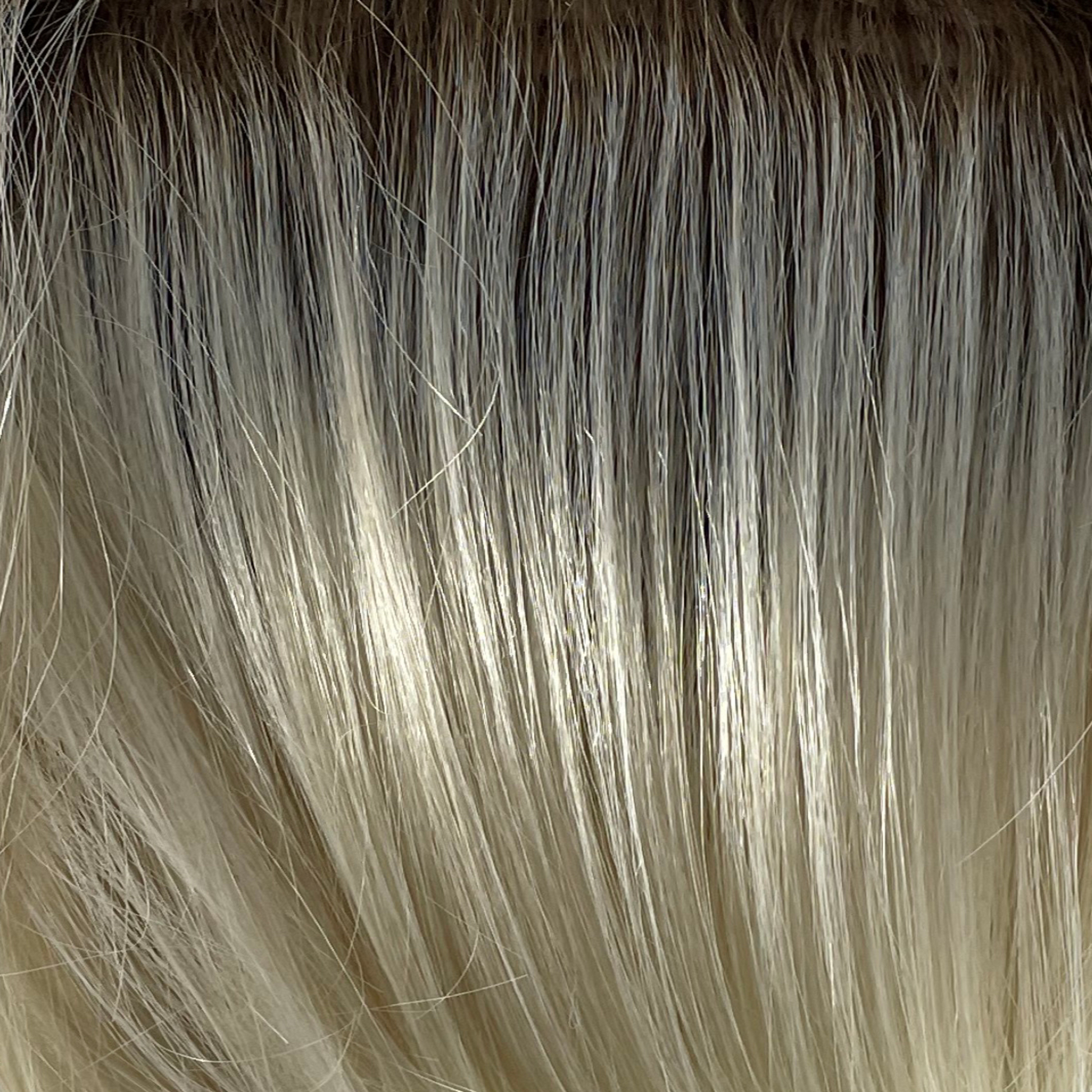 Seashell Blond-R - A mixture of cool white blond and creamy white tones combined with a soft brown root.