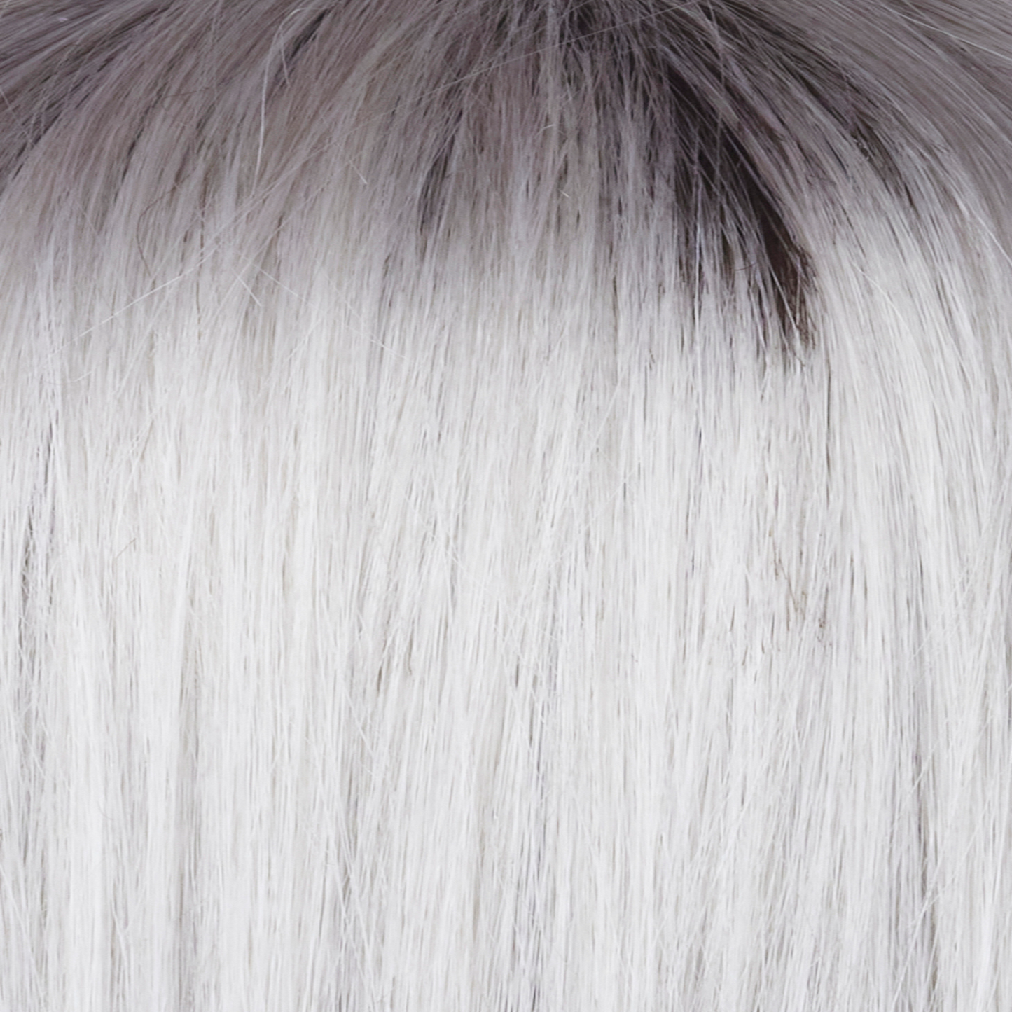 Smoke Ivory - A mid cool beige brown root that is softly blended into the sublime finely woven white, platinum, ivory and smoked ivory strands. These then transcend into white tipped ends.