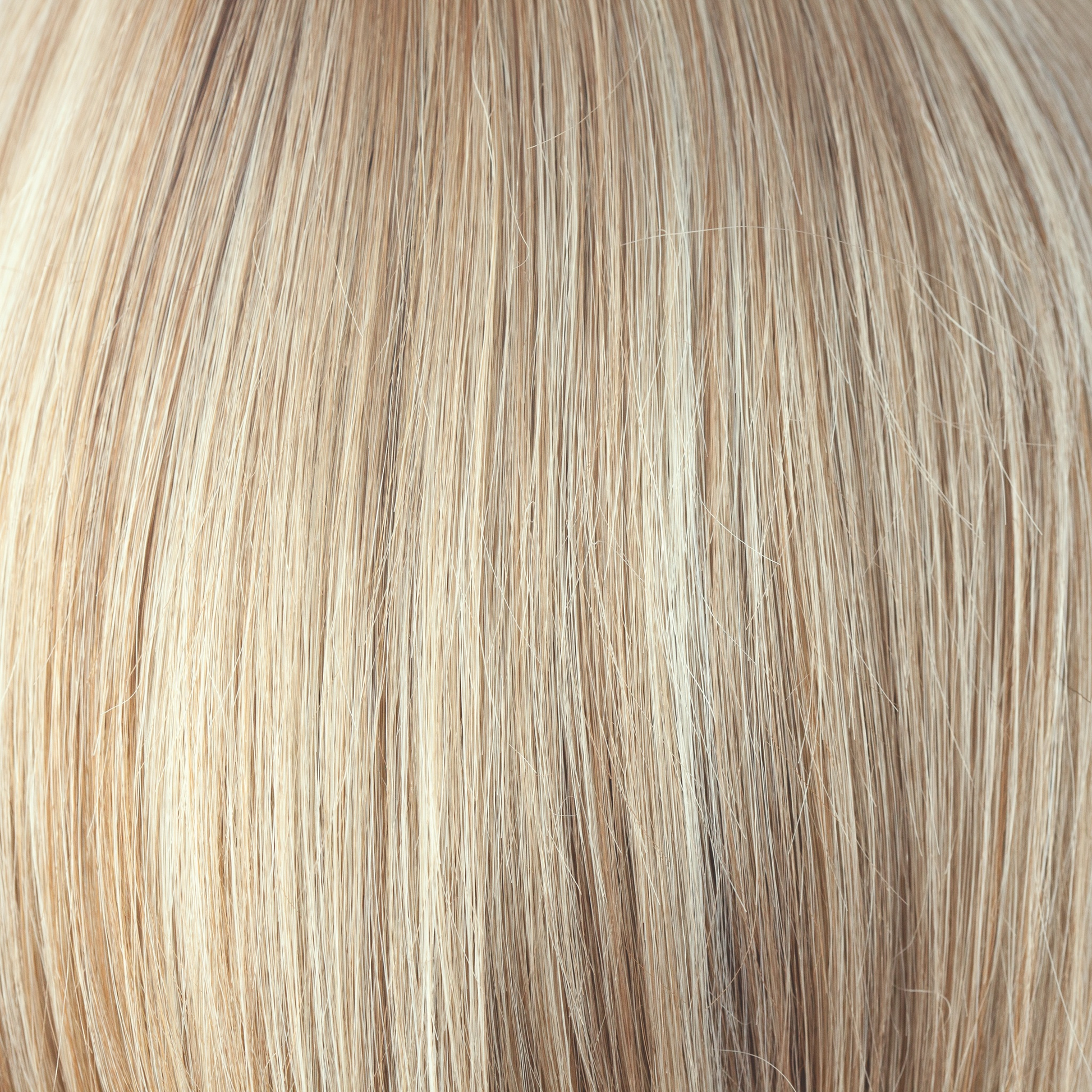 Sugar Cane  -  A medium blonde base with burnt toffee, caramelized sugar lowlights and dusty blonde highlights.