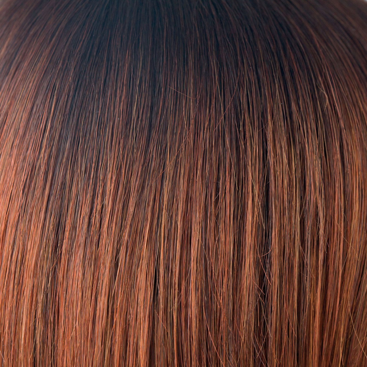 Crimson-R - A beautiful mid brown chocolate root that seamlessly blends into cool coppers and smoked orange tones. If you want to stand out, this is an excellent color choice!