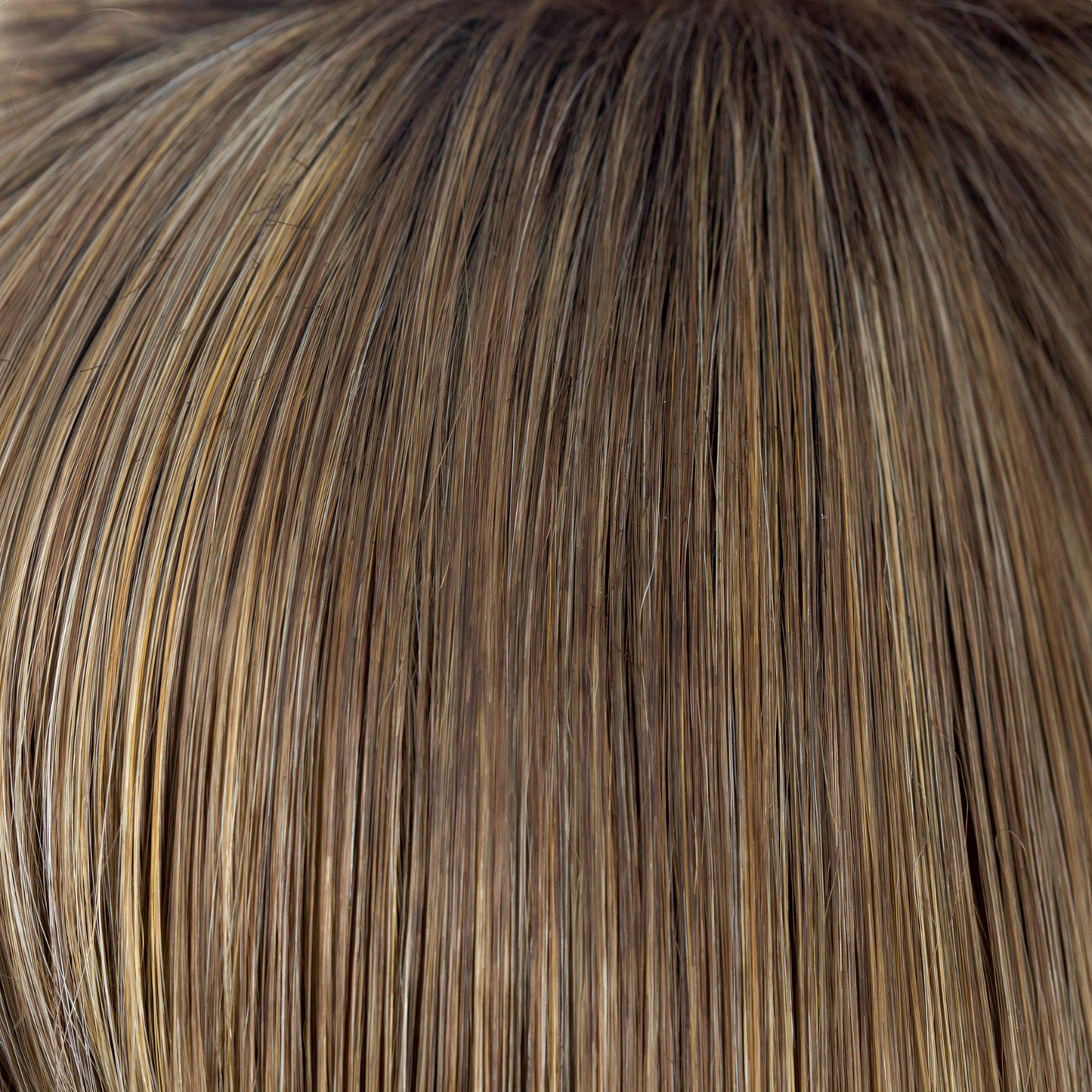 NM Mochaccino  -  A rich medium warm blond. The color has highlights of cream and icy coconut with a slight undertone of chocolate. This color is natural looking with an intelligently, placed, blended regrowth making this color so irresistible!