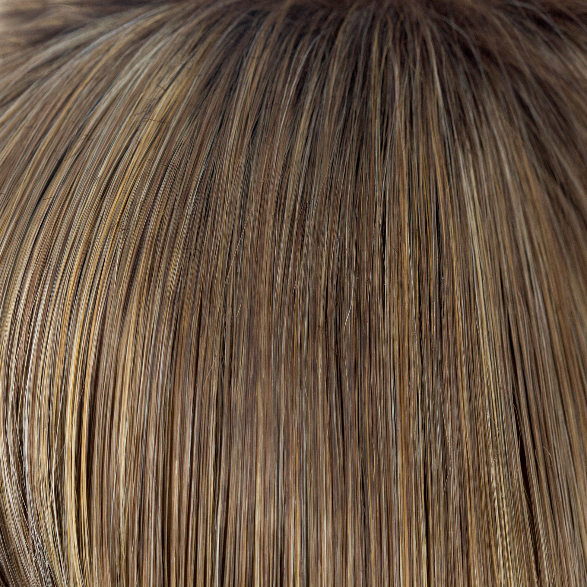NM Mochaccino  -  A rich medium warm blond. The color has highlights of cream and icy coconut with a slight undertone of chocolate. This color is natural looking with an intelligently, placed, blended regrowth making this color so irresistible!